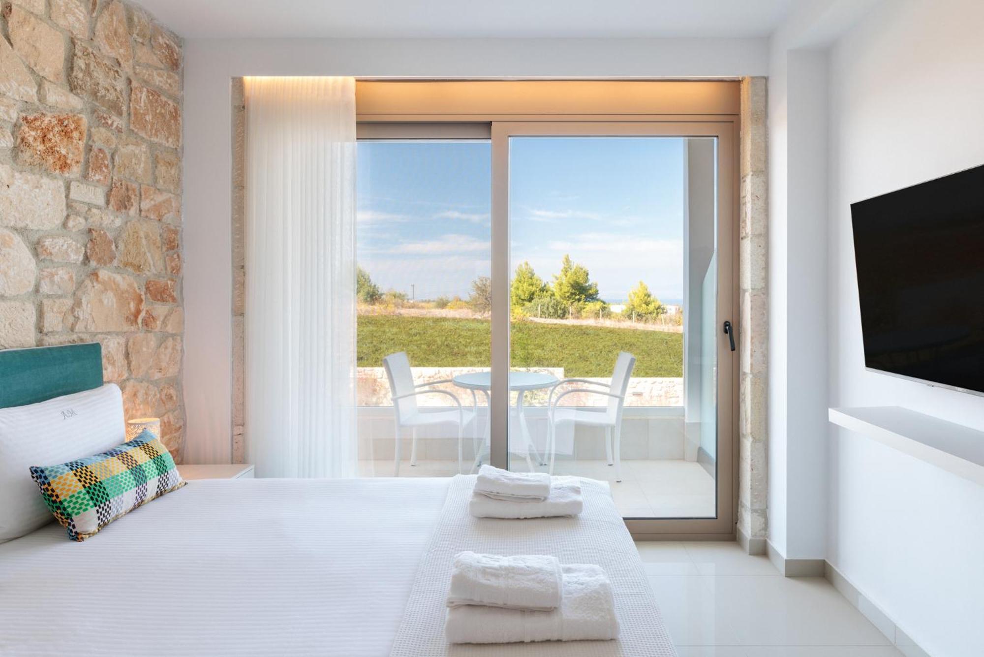 Anna Mare Luxury Apartments Афитос Номер фото